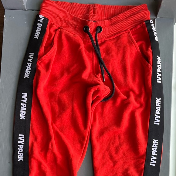 IVY PARK Pants - Ivy Park orange statement joggers